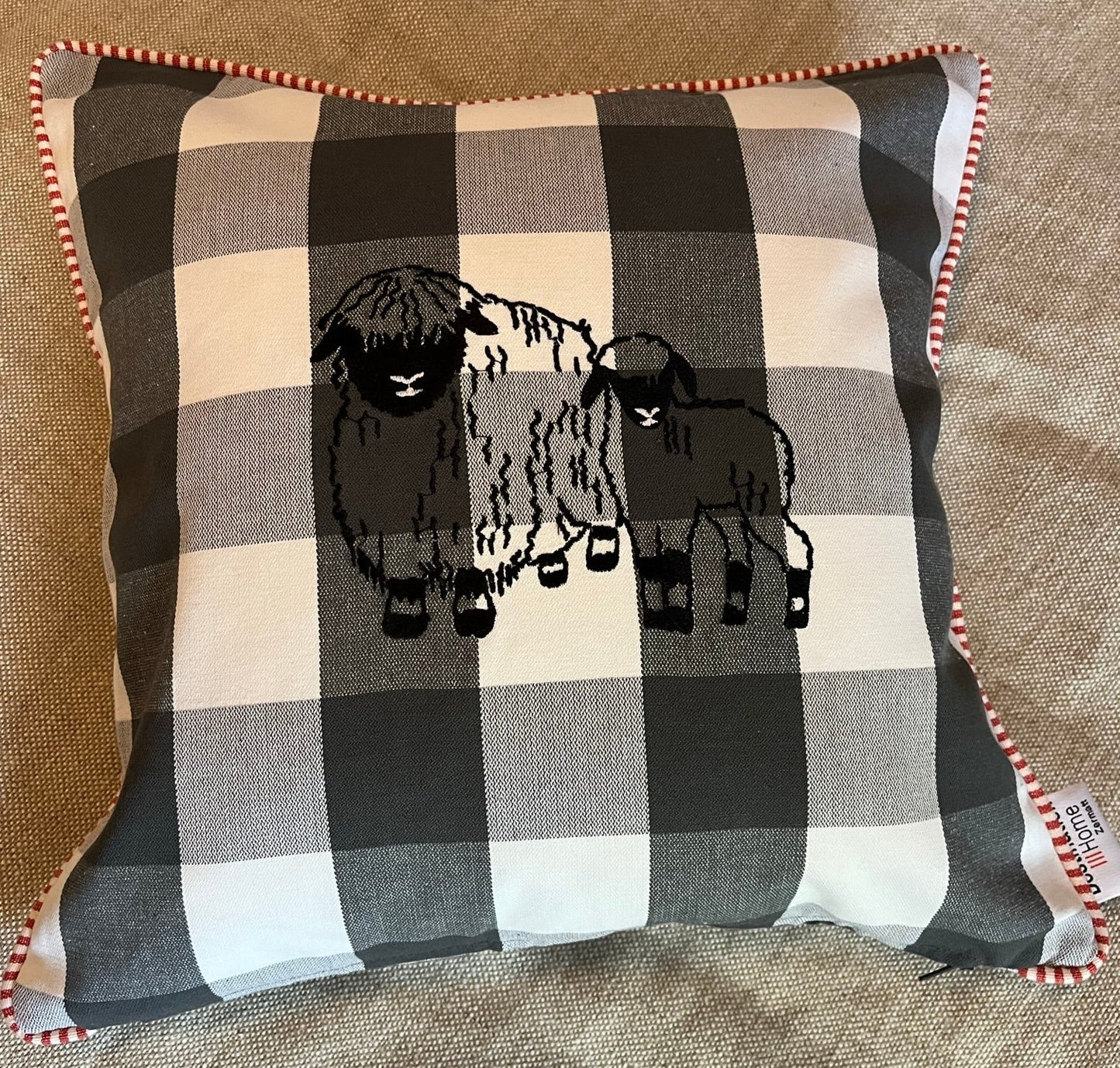 Blacknose sheep cushion cover, two sheep, orange/white