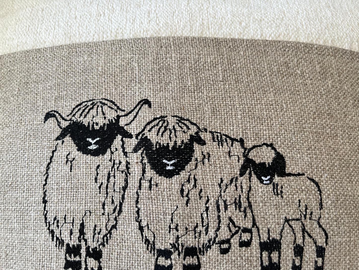 Blacknose Sheep cushion cover, three sheep, cream
